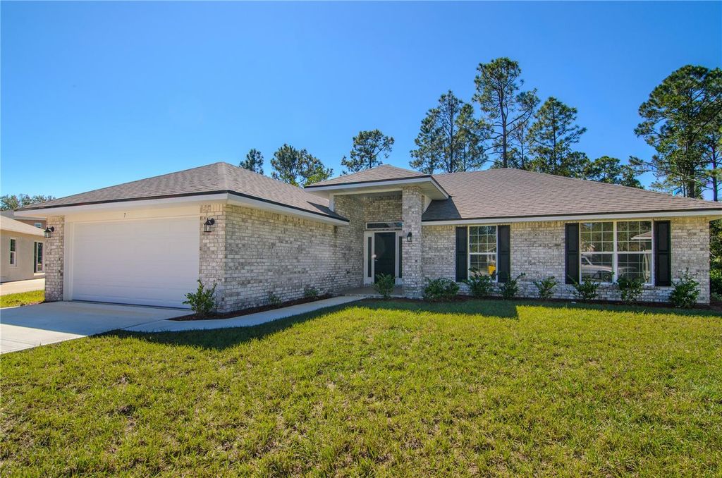 Photo of 31 Rybark Lane, Palm Coast, FL 32164 (MLS # FC314646)