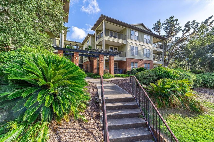 WALK TO THE UNIVERSITY OF FLORIDA, SORORITY ROW, AND UF HEALTH SHANDS HOSPITAL! Rare condo in Campus View that comes with 2 ASSIGNED PARKING SPACES! This 3 bed/3 bath floor plan has a spacious living room, large kitchen, breakfast bar, dining area, and indoor laundry room with washer & dryer. Off of the living room, there is also a large covered patio. Enjoy 3 spacious bedrooms, each with their own bathroom and closet. Additional upgrades include stainless steel refrigerator & oven/range and tile & luxury vinyl plank flooring throughout - no carpet! With 2 ASSIGNED PARKING SPACES and the convenience of being walking distance to UF Campus, Sorority Row, and Shands Hospital, this condo offers comfort and location!