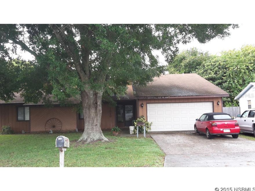 Excellent buy on this very large house at 62 per sq ft living area plus double garage.3 bedrooms 2 baths plus Dining Room plus Family Room with fire place and also a Florida room. Fenced back yard. Tile in EVERY room. Vaulted ceilings. 2 skylights.  Eat in kichen. Large entry vestibule are. Close to shopping and schools. New AC. IF YOU TAKE OFF THE PRICE OF THE LOT ($20,000), THIS HOUSE IS BEING SOLD FOR $44 PER SQ FOOT WITH A DOUBLE GARAGE NOT COUNTED INTHE THT FIGURE ;Water: City