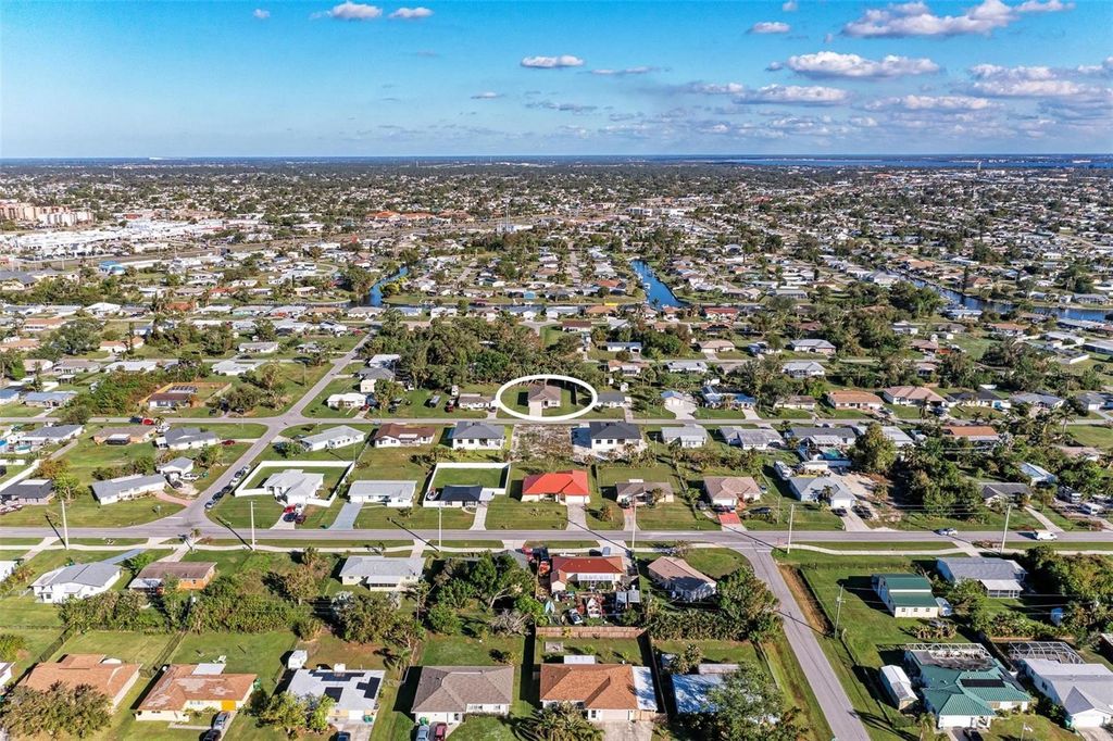 Photo of 3332 Elkcam Boulevard, Port Charlotte, FL 33952 (MLS # TB8468337)