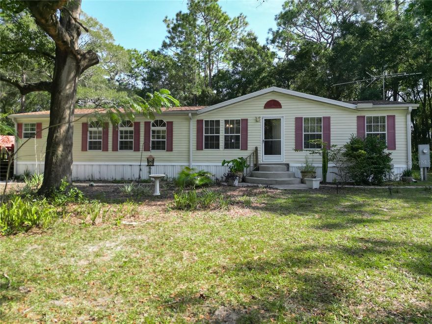 Are you ready to discover your dream home? I’m excited to share a meticulously maintained and partially furnished property that offers the perfect blend of country living and convenience, located just minutes from the Equestrian Center. NO HOA or lease restrictions, you have the freedom to personalize your space as you wish. The roof and AC were updated in 2018, providing peace of mind for you.
This stunning home is set on a spacious 1.03 acres and features:
- 3 Bedrooms and 2 Bathrooms in 1,620 SF
- A welcoming open living and dining room combo, perfect for gatherings
- A spacious kitchen with plenty of cabinets, spacious pantry, a breakfast bar, and lots of natural light
- A generous primary bedroom with a large walk-in closet and a private en-suite bath with dual vanities
- A privacy fence to enjoy your mornings or relax in the beautiful Florida weather
- An RV port for extra convenience
What’s more, this home comes partially furnished with a complete dining room set, comfortable couches in the living room, various furnishings in the bedrooms, and an additional refrigerator.
Don’t miss out on this fantastic opportunity! Call today to schedule your private tour and experience all that this property has to give.