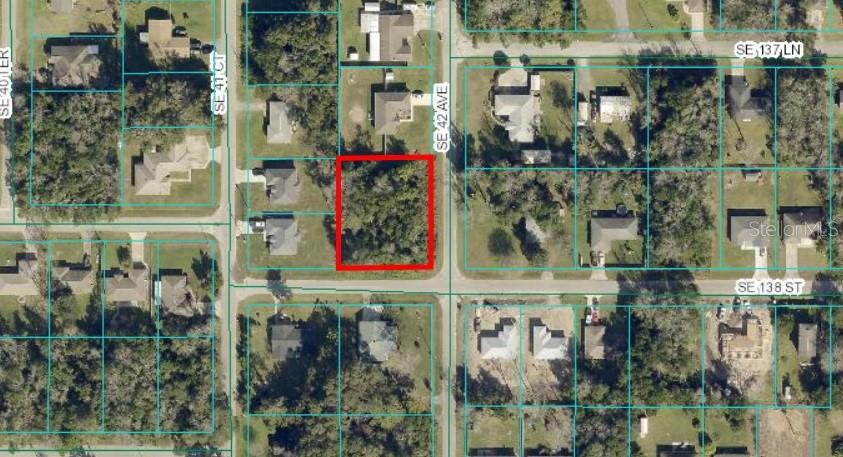 Beautiful large corner lot on paved roads, sitting in the middle of Belleview Heights this property holds a lot of potential.