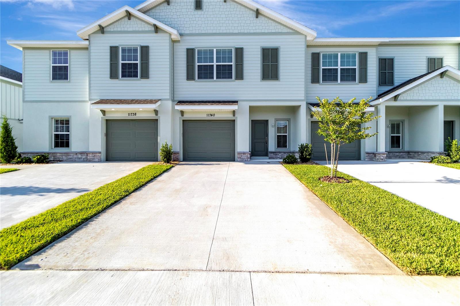 Welcome home to this newly constructed townhouse in the Laurel Bay Townhomes community, built by Sunrise Homes. This two-story residence offers 3 bedrooms and 2 and a half bathrooms across 1756 square feet of living space. The first floor features an open-concept living, dining, half bathroom, and kitchen area. Upstairs, you'll find three spacious bedrooms, two bathrooms.Additional amenities include a private patio, attached one-car garage, and access to community sidewalks. The property is conveniently located near I-4 and I-75, providing easy access to shopping, entertainment, services, and schools