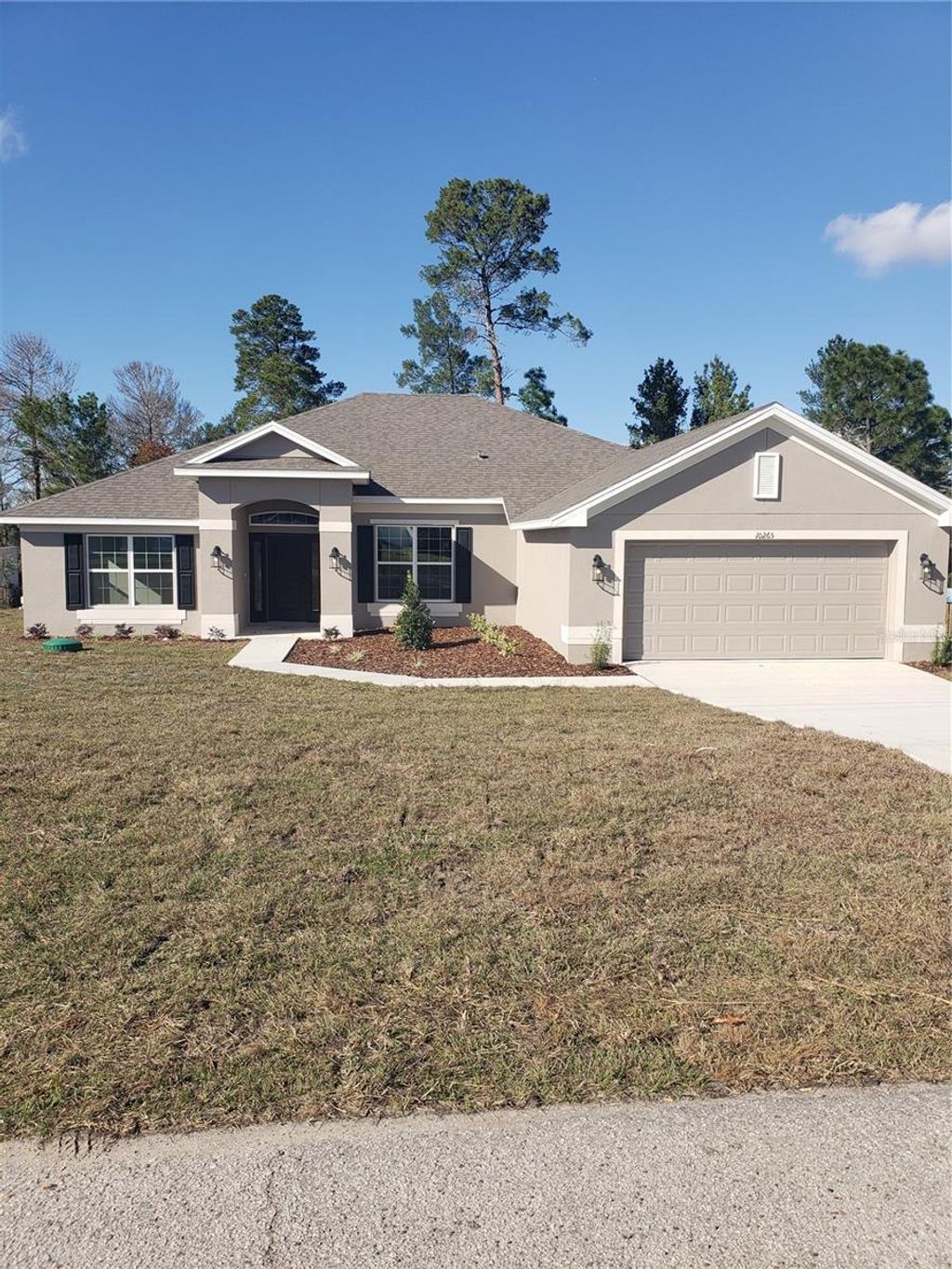 Photo of 10265 Jordan Street, Spring Hill, FL 34608 (MLS # OM708112)