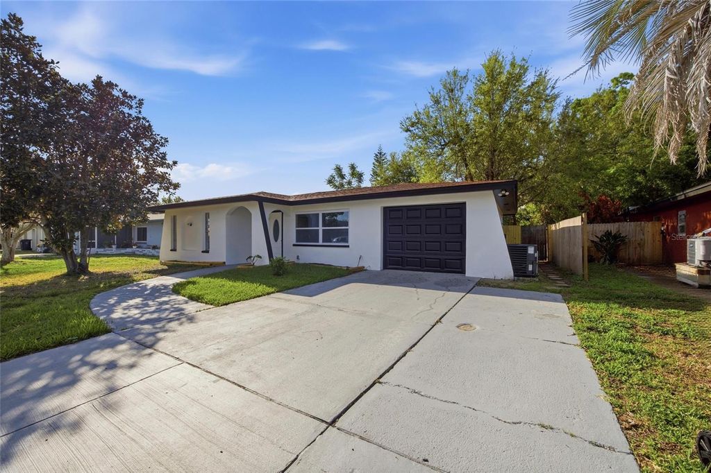 Photo of 1811 Driftwood Circle S, Oldsmar, FL 34677 (MLS # TB8488580)