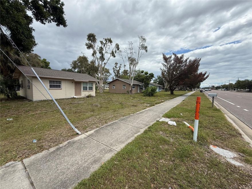 Check out this multi-family investment in west St. Petersburg known as Long Villas: a fully leased, individually parceled, 14 block-built villas on 15 parcels totaling 2.76-acres. R-2-zoned and all in Flood Zone X. The complex has 15 parcels with 14 (2-bedroom, 1-bath) villas and 1 vacant lot for expansion. Four villas on 54th Ave feature carports and exterior utilities, while ten villas on 55th Ave include bonus rooms and interior hookups—each home is equipped with wall-mounted A/C in every bedroom plus a central living-room wall unit with heat. All villas have a less than 2 year old roof. Individual electric meters and public utilities ensure efficient operations, and the expansive, multi-parcel site presents redevelopment upside with one of the lots vacant. Broker is also the owner of the property and any showing requests by appointment only. Property to be sold as a whole or separately. Call Broker/Owner for details.