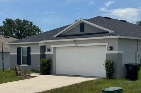 Photo of 1459 Geranium Drive, Mascotte, FL 34753 (MLS # S5151646)