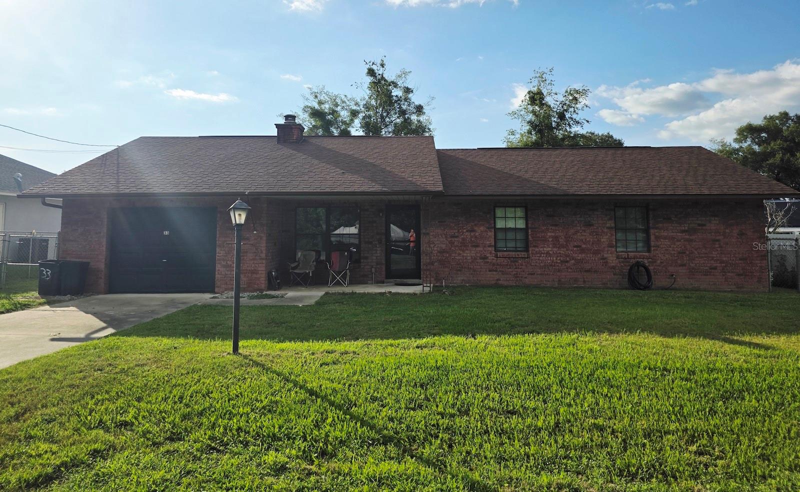 Auction Property. LIST PRICE IS FOR MLS PURPOSES ONLY. ACTUAL PRICE WILL BE DETERMINED AT AUCTION. ONLINE AUCTION ENDS AUG. 27 AT 1 PM ET. Move-in ready 3BR/2BA home with bonus room. The concrete block construction home has 1,547± sf of living area with 1,986± sf under roof. It is situated on a .23± acre lot in a well established neighborhood with no HOA. Luxury vinyl flooring throughout the main area; carpet in bedrooms for comfort. Spacious primary suite with walk-in closet and private bath. Indoor laundry/utility room with easy access to water heater and HVAC system. Lighted ceiling fans throughout. Fully fenced backyard with drive-thru and walk-thru gates. Covered front porch and welcoming curb appeal. Located approximately two blocks from Marjorie Harris Carr Cross Florida Greenway that provides direct access to miles of trails. Minutes to Silver Springs State Park, Publix, Walmart and local dining. Short drive to Downtown Ocala and major highways for easy commute. Perfect for first-time home buyers or investors. Property #: DG1491. Bid Online August 20 - 27. 10% Buyer's Premium. Subject to the final bid at the online auction and auction terms.