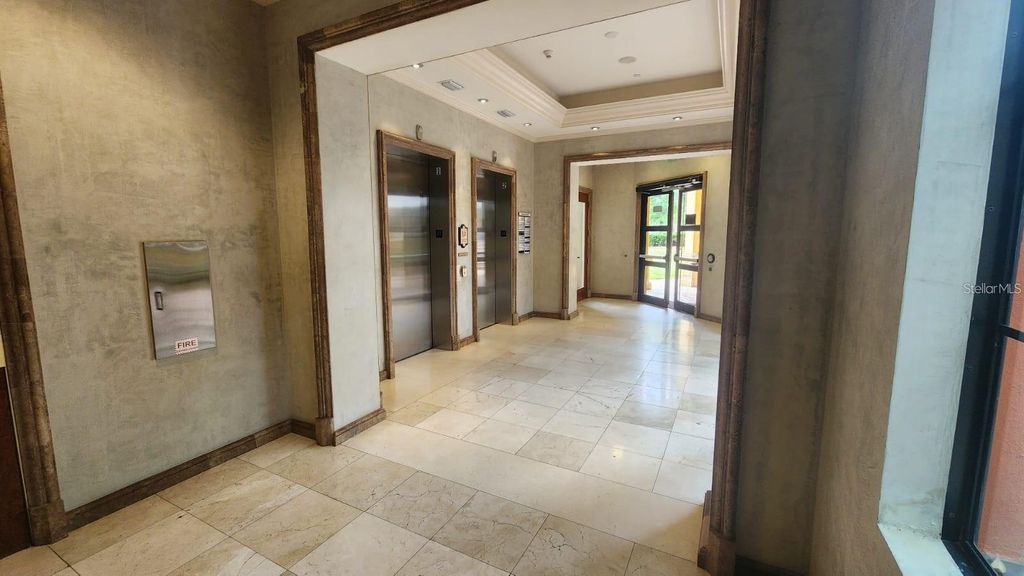 Photo of 7065 Westpointe Boulevard #305, Orlando, FL 32835 (MLS # O6392011)