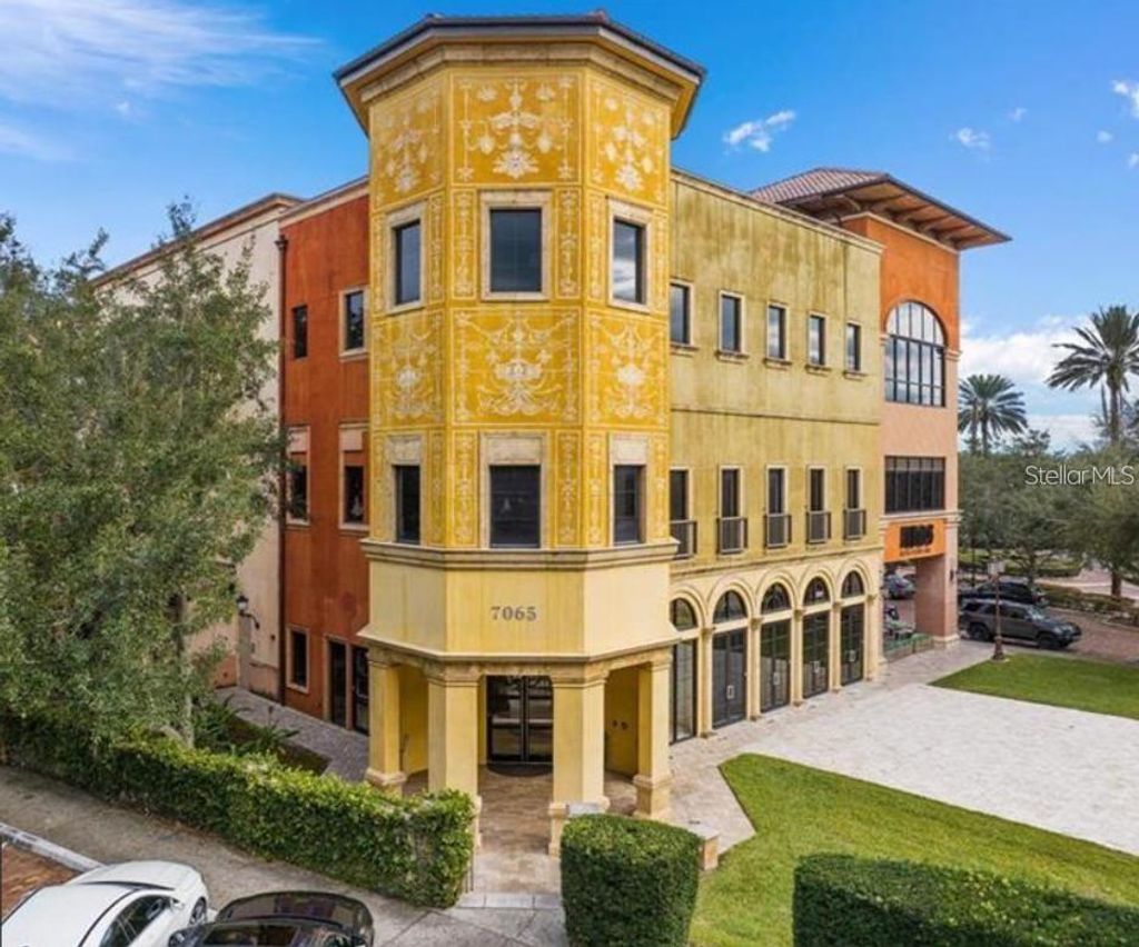 Photo of 7065 Westpointe Boulevard #305, Orlando, FL 32835 (MLS # O6392011)