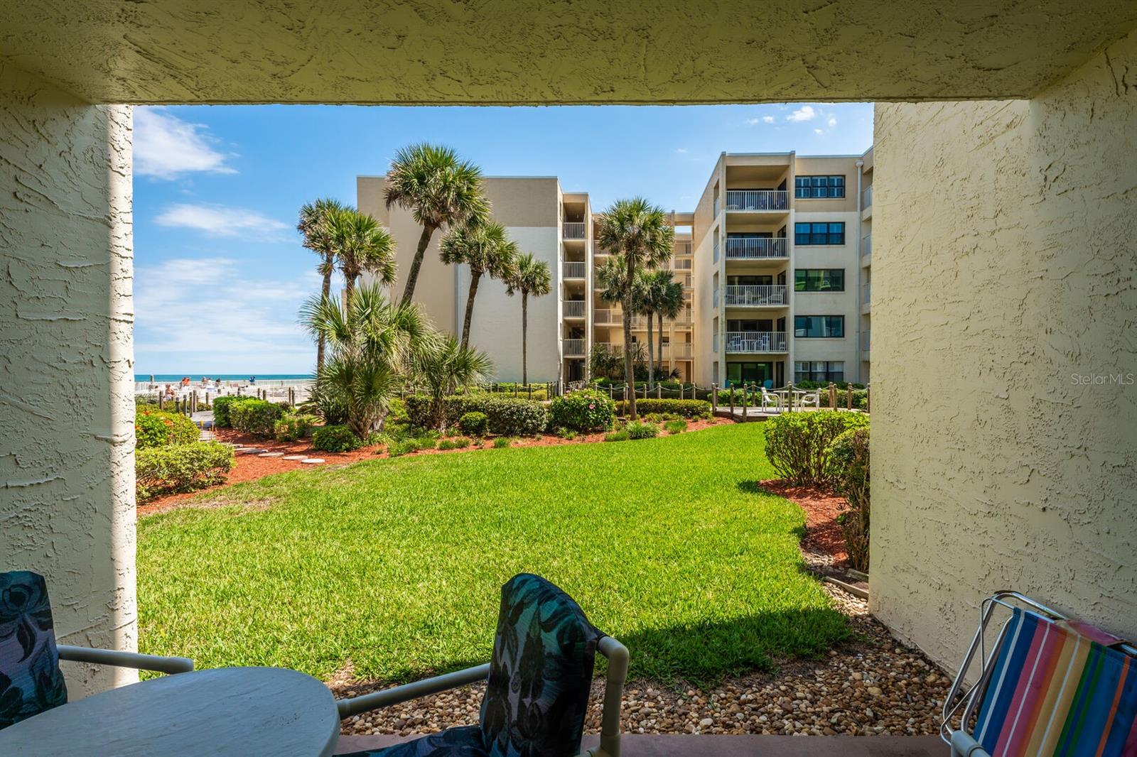 107 - This professionally decorated two-bedroom, two-bath ocean-view unit is on the 1st floor. Walk right out the sliding glass door from the living room into the courtyard/pool/beach. The unit is well-lit and bright, with a new 55" LG" Smart TV, a DVD player with DVDs, cable TV, and board games and cards for your enjoyment. The unit has high-speed Wi-Fi for your smart devices and AC and humidity control.
The living room has a pull-out couch with a queen premium memory foam mattress, two chairs, and a ceiling fan. The fully equipped kitchen has all-new cupboards, granite countertops, a microwave, ice maker, disposal, dishwasher, toaster oven, 12-cup coffee maker, blender, crock pot, a complete set of dishes, and glass/plastic wine glasses, beer koozies, BBQ utensils for outdoor grilling, electric can opener and plenty of cookware. The dining room table has a leaf to expand the table and six chairs. The main bedroom has a king-size bed, a 32" TV" c "ili" g, "an alarm clock, and a large closet with blankets and extra pillows. The master bath has a granite countertop, raised toilet, hair dryer, and bathtub.
The 2nd bedroom has two twin beds, a TV, a ceiling fan, an alarm clock,k and a looser with an ironing board and iron, extra blankets, and pillows. There are also beach chairs, a cooler, boogie boards, and towels. The 2nd bathroom has a granite countertop, raised toilet, hair dryer, and a shower with glass doors. The patio has four cushioned chairs and a round table. Come and enjoy the ultimate beach holiday in this stunning unit.