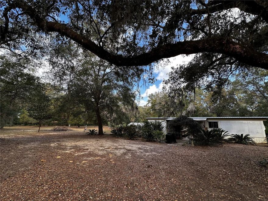 Opportunities like this don’t come around often—don’t miss your chance to make this property your own! Discover incredible potential with this 2-bedroom, 1.5-bathroom mobile home situated on two acres of peaceful, private land. If you’ve been searching for space, flexibility, and an opportunity to create your own retreat, this property delivers all of that and more. enjoy recreational opportunities Lake Kerr has to offer. This 2,800-acre spring-fed lake is known for excellent fishing, boating, and water sports. Nearby attractions include Salt Springs Recreation Area, Lake George, and the St. Johns River. Ocklawaha river and rodmen reservoir. The area also boasts extensive ATV, horseback, and hiking trails, along with year-round hunting and fishing. Conveniently located near everyday essentials—grocery stores, gas stations, restaurants, and hardware stores—this home is just 30 minutes from Ocala and Palatka.