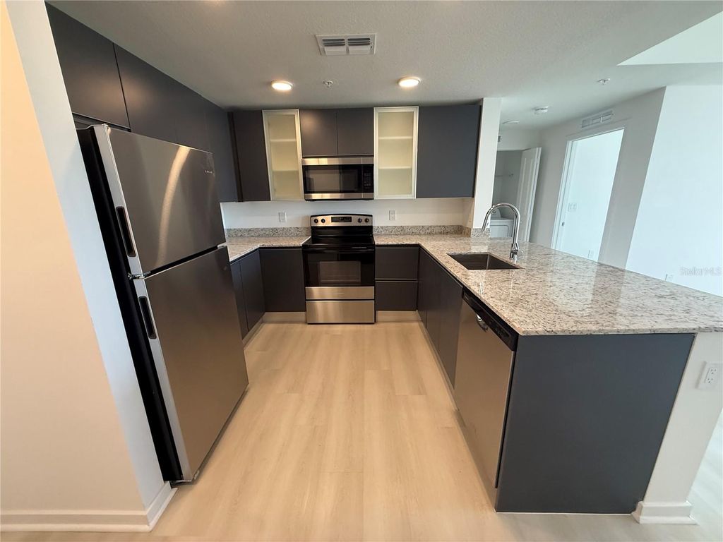 Photo of 5579 Millenia Park Boulevard #410, Orlando, FL 32839 (MLS # O6398893)