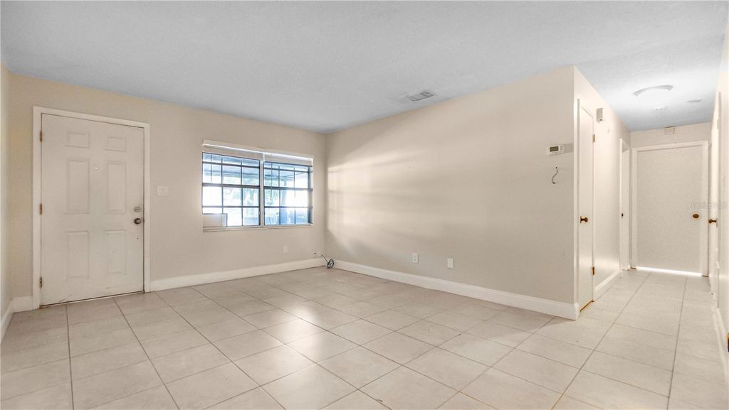 Photo of 4880 Lake Ridge Road #7, Orlando, FL 32808 (MLS # O6397636)