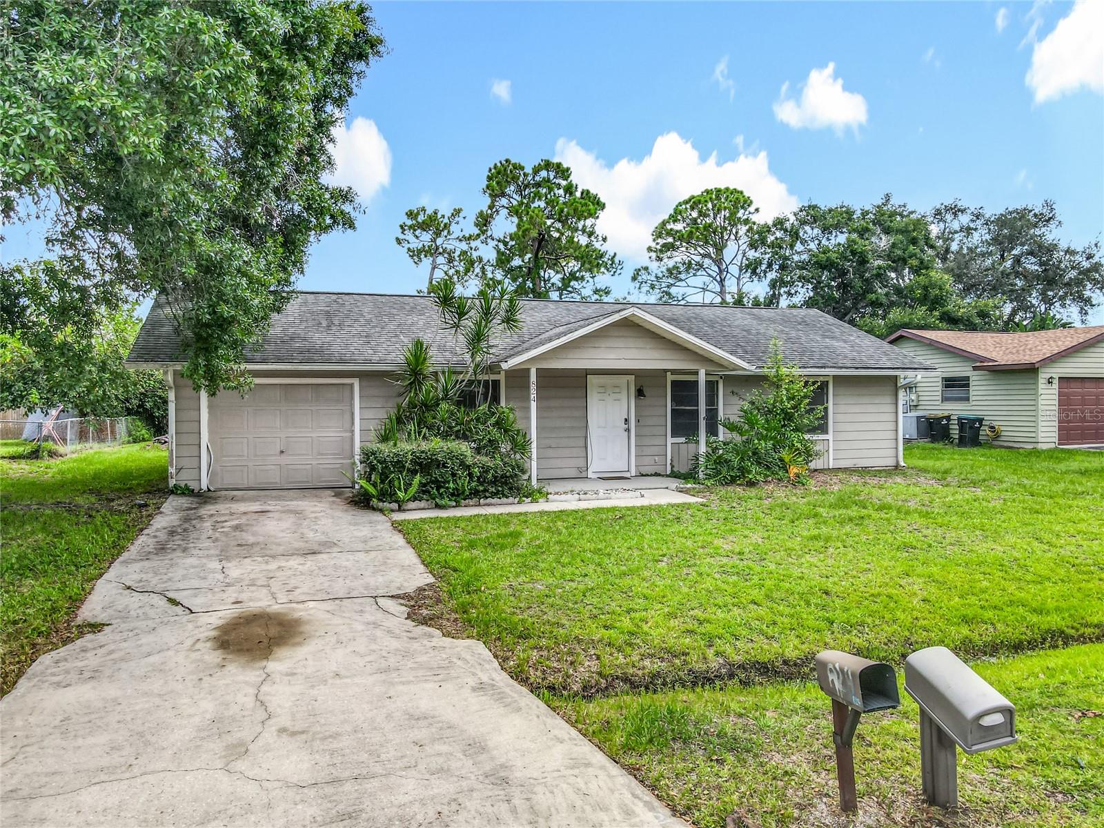 Charming 3-bedroom, 2-bath home with a 1-car garage in Palm Bay. This home offers a comfortable layout with spacious living and dining areas, a functional kitchen, and well-sized bedrooms. The fenced backyard provides plenty of space for relaxing, entertaining, or future enhancements. With a solid foundation and great bones, this home is perfect for buyers looking to bring their own style and updates. Conveniently located near shopping, dining, schools, and major roadways, it’s a fantastic opportunity to make a great home your own.