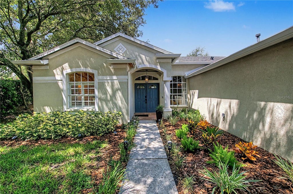 Photo of 9402 Hunters Pond Drive, Tampa, FL 33647 (MLS # TB8533932)