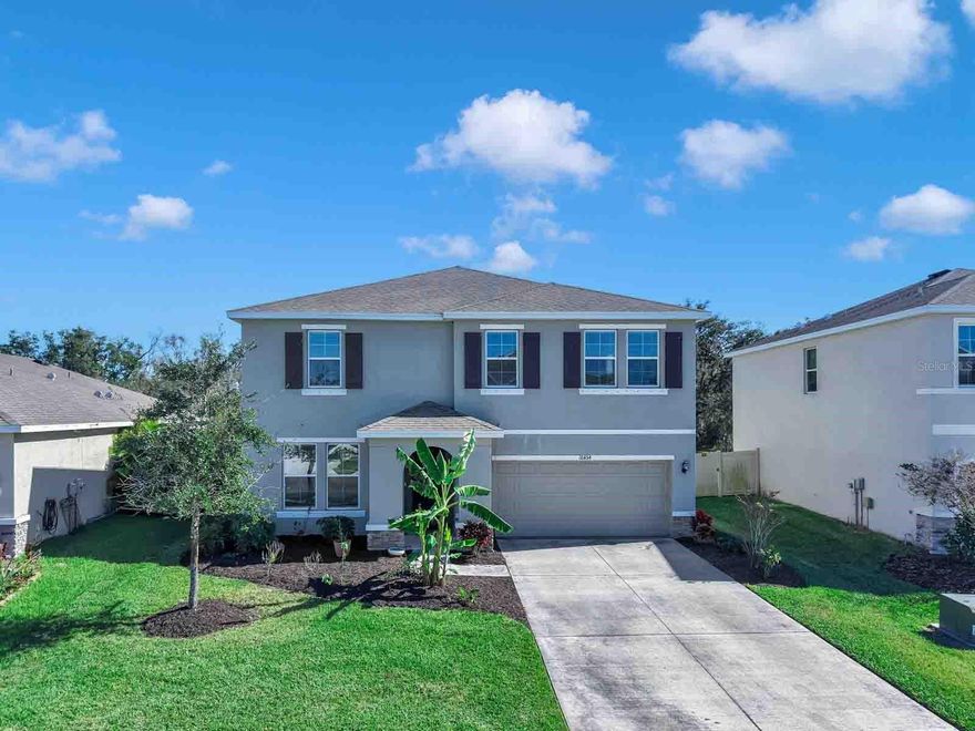Experience the perfect blend of space, modern efficiency, and Florida tranquility in this pristine 2021-built residence. Tucked away on a quiet dead-end street in the rapidly growing Parrish community, this home offers nearly 3,000 sq. ft. of versatile living space designed for those who refuse to compromise on comfort or value. Home Highlights: 5 spacious bedrooms and 3 full bathrooms, this layout is engineered for privacy and flow. Enjoy a fresh start with professional interior paint, deep cleaned tile and grout, and steam-cleaned carpets throughout.
The expansive open concept kitchen serves as the heart of the home, complete with abundant cabinetry and a butler’s pantry perfect for coffee stations, meal prep, or staging for guests. Two distinct bonus areas provide the ultimate "work-from-home" or "play-from-home" flexibility. One flex room includes a massive closet, offering an easy transition into a 6th bedroom if needed. Relax on your property with peaceful views of a tranquil pond and permanent conservation land, ensuring your backyard remains a private retreat. Located in the heart of Parrish in the community of Southern Oaks, you are minutes away from local shopping, dining, and parks. With quick access to I-75, you enjoy a seamless commute to Bradenton, Sarasota, and St. Pete, putting the Gulf beaches within easy reach. Schedule your tour today!