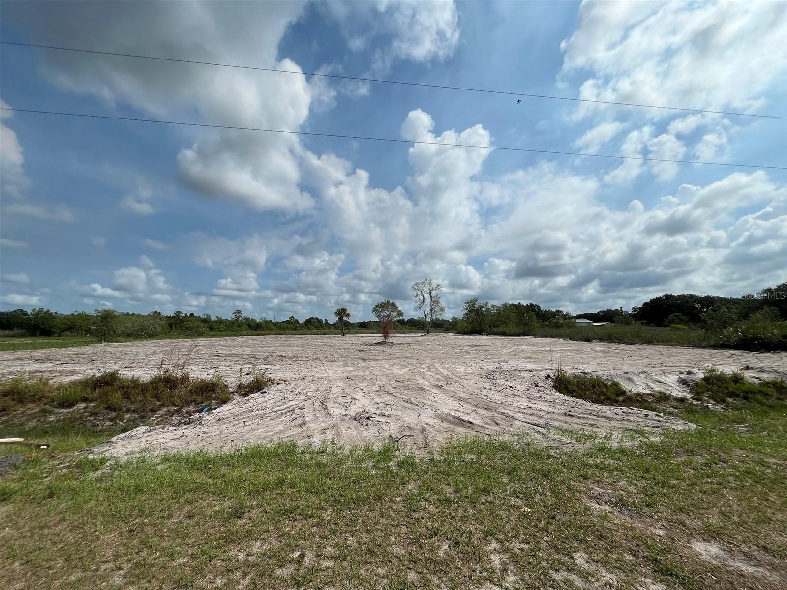 Build or bring your dream home on this spacious 1.25-acre cleared lot. Cleared with culvert in place. Not far off the paved road. Residents can enjoy the privacy of a rural setting while still being close to essential amenities. The area is a haven for outdoor enthusiasts, boasting attractions like the Kissimmee River Preserve State Park and the expansive Lake Okeechobee, famous for its excellent fishing opportunities. Whether it's fishing, hunting, agriculture, or simply a desire for privacy, Okeechobee County provides an idyllic backdrop to create a personalized retreat.