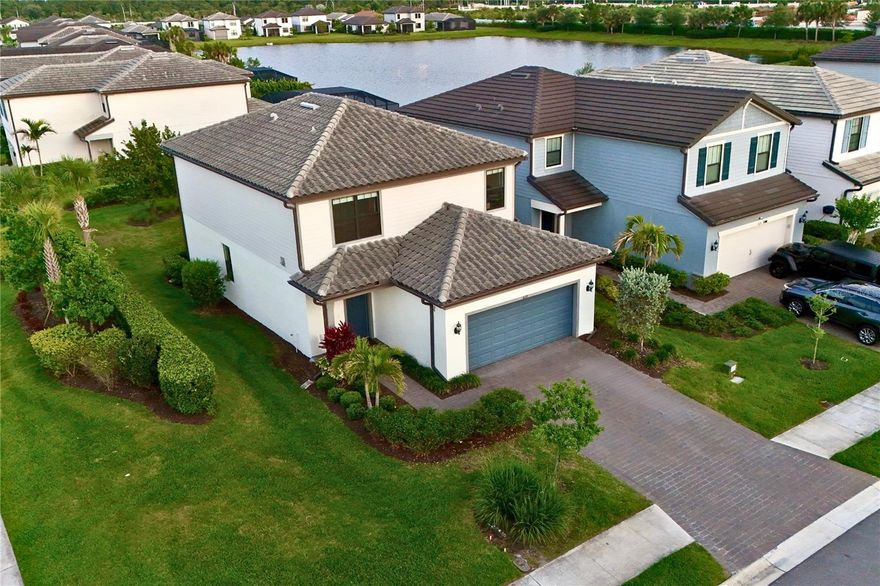 One or more photo(s) has been virtually staged. Welcome to paradise in this spectacular end-unit residence located at 6111 Bluestar Court within the highly coveted Sapphire Point community of Lakewood Ranch! Family and Pets friendly. This stunning two-story home perfectly captures the essence of Florida living, offering a bright and airy atmosphere enhanced by its premier corner location. Step outside to your private screened lanai and enjoy peaceful views of the water to your right, providing the ultimate backdrop for your morning coffee or evening relaxation.

The interior flow is designed for both comfort and style, featuring an open-concept layout that makes entertaining a breeze. Living in Sapphire Point means embracing a resort-style lifestyle where world-class amenities are just steps away, including a magnificent clubhouse, state-of-the-art fitness center, community pool, and a dog park. The location is truly unbeatable, situated just 15 minutes from the excitement of the Sarasota Polo Club, Premier Sport Campus at Lakewood Ranch, The Premier Shopping at UTC Mall, and the top-rated Lakewood Ranch Medical Center. Families will appreciate being zoned for some of the best elementary, middle, and high schools in the region.

When you are ready to explore further, you are only 30 minutes away from the breathtaking Gulf Coast, famous for its sugary sands, turquoise waters, and frequent dolphin sightings. Whether you are enjoying the robust calendar of community activities or exploring the vibrant local area, this move-in-ready masterpiece offers the perfect balance of elegance and convenience. Don't miss your chance to own a piece of the Florida dream in one of Lakewood Ranch's most vibrant neighborhoods! Welcome to your Dream Home!!!