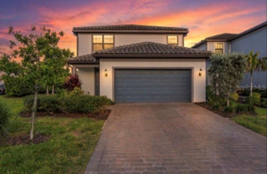 One or more photo(s) has been virtually staged. Welcome to paradise in this spectacular end-unit residence located at 6111 Bluestar Court within the highly coveted Sapphire Point community of Lakewood Ranch! Family and Pets friendly. This stunning two-story home perfectly captures the essence of Florida living, offering a bright and airy atmosphere enhanced by its premier corner location. Step outside to your private screened lanai and enjoy peaceful views of the water to your right, providing the ultimate backdrop for your morning coffee or evening relaxation.

The interior flow is designed for both comfort and style, featuring an open-concept layout that makes entertaining a breeze. Living in Sapphire Point means embracing a resort-style lifestyle where world-class amenities are just steps away, including a magnificent clubhouse, state-of-the-art fitness center, community pool, and a dog park. The location is truly unbeatable, situated just 15 minutes from the excitement of the Sarasota Polo Club, the premier shopping at UTC Mall, and the top-rated Lakewood Ranch Medical Center. Families will appreciate being zoned for some of the best elementary, middle, and high schools in the region.

When you are ready to explore further, you are only 30 minutes away from the breathtaking Gulf Coast, famous for its sugary sands, turquoise waters, and frequent dolphin sightings. Whether you are enjoying the robust calendar of community activities or exploring the vibrant local area, this move-in-ready masterpiece offers the perfect balance of elegance and convenience. Don't miss your chance to own a piece of the Florida dream in one of Lakewood Ranch's most vibrant neighborhoods! Welcome to your Dream Home!!!