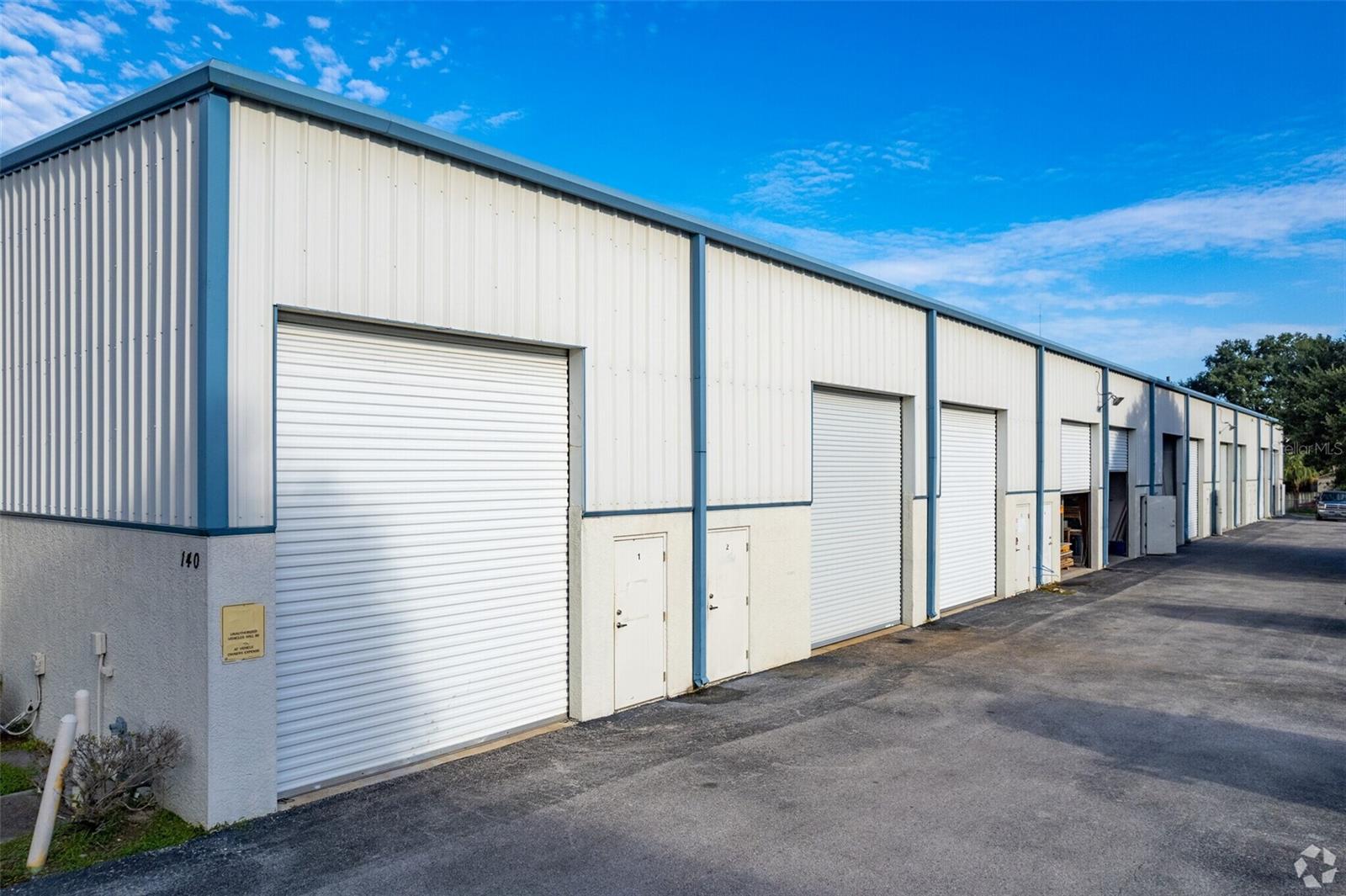 Perfect location! Located just off Alternate 19 near Downtown Tarpon Springs, Historic Sponge Docks and Famous Pinellas Trail. Very clean and well maintained facility with water and trash included. Plenty of parking and well lit at night. Warehouse space is 2500 square feet, which includes large roll up, man door, private bathroom, cabinet storage and loft. The ceilings are 24 feet high. Very clean and well maintained facility with ample parking. Water, sewer, trash dumpster, and out door lighting included.