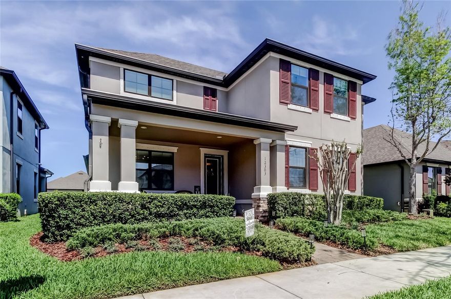 Welcome to this beautifully designed home in Starkey Ranch, where charm, functionality, and outdoor living come together seamlessly. With the rear-entry garage, this home offers a gorgeous front elevation and a spacious front porch, perfect for morning coffee and connecting with neighbors.

Inside, you’ll find a versatile front flex room, ideal for a home office, sitting area, or playroom. The main living space is thoughtfully designed with an open-concept layout, featuring a large kitchen with an oversized island that flows effortlessly into the dining and living areas, highlighted by an elegant tray ceiling. The primary suite is conveniently located on the first floor, offering comfort and privacy.

Step outside to your own backyard retreat, complete with a fully equipped outdoor kitchen, an oversized in-ground spa with a waterfall feature, a firepit area, and a fenced yard with garden space—perfect for entertaining or relaxing.

Upstairs, you’ll find two additional bedrooms with walk-in closets, a guest bathroom, and a huge bonus room offering flexible space for a second living area, playroom, or home office.

Located just one block from Starkey Ranch K-8, this home offers incredible convenience for daily school routines.

With Whitfield Park around the corner, you’ll have nature, a community pool, and playground just minutes from your door. Living in Starkey Ranch means access to an unmatched lifestyle: 3 community pools, playgrounds, 20+ miles of walking/biking trails, dog parks, community garden, kayak lake, and year-round activities led by a full-time director. Enjoy Starkey Ranch K-8 STEM Magnet School, public library, theater, and District Park with fields for every sport. Shopping, dining, entertainment, the airport, and Gulf beaches are all within 30 minutes. This meticulously maintained home combines space, style, and location — offering the very best of Starkey Ranch living.