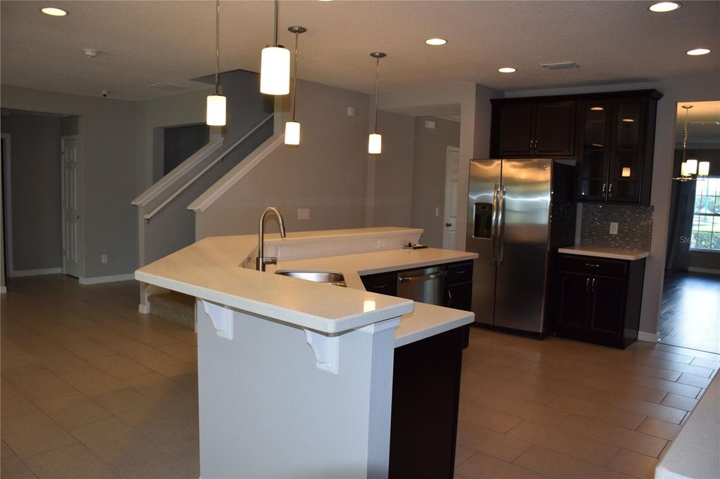 Photo of 489 Ogelthorpe Drive, Davenport, FL 33897 (MLS # O6387232)