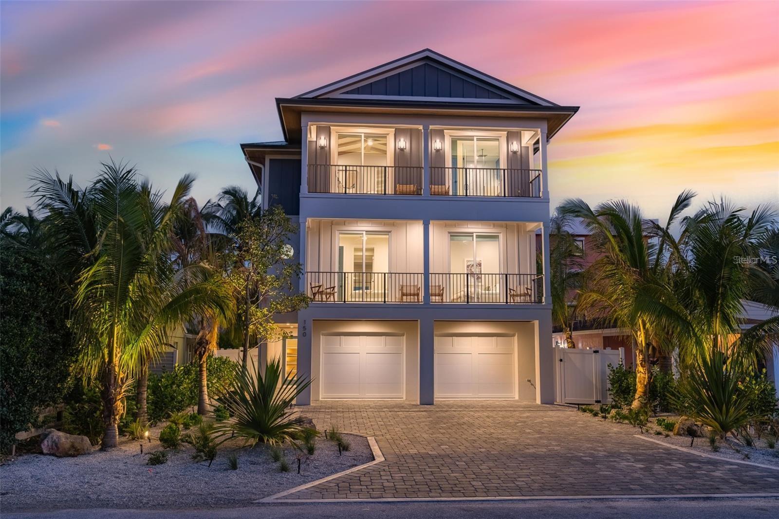Under contract-accepting backup offers. BRAND NEW 8 BEDROOM 8 1/2 BATH TURNKEY FURNISHED COASTAL HOME IS AN ABSOLUTE MASTERPIECE!!! Welcome to this extraordinary home with highly desired southern exposure, presenting a luxurious opportunity in the sought-after Lido Key area. With the convenience of an elevator servicing all floors, vaulted ceilings, a rooftop terrace, 8 bedrooms, 8 full baths, and 1 half bath. Located just a block away from the pristine shores of Lido Key Beach, this property offers unparalleled accessibility, with a leisurely 2-minute stroll to the beach or a quick 4-minute bike ride to the vibrant St. Armand's Circle. Embrace breathtaking vistas from the expansive balcony, granting you a captivating preview of the finest views Lido Key has to offer, including the Gulf of Mexico and Downtown Sarasota. Picture yourself savoring coffee or cocktails while basking in the sun on the rooftop terrace, balcony, or the inviting and sun-soaked expansive patio. Exquisitely designed with meticulous attention to detail, the interior showcases a tasteful luxury coastal palette, featuring premium materials throughout. On the ground level, this residence comprises a 2-car garage, a welcoming entry foyer, and convenient access to the stairs or elevator. Stepping into the backyard, you'll discover a splendid pool with a slide, a rejuvenating spa, and a lushly landscaped covered patio with ample seating, offering an idyllic setting for private and memorable outdoor gatherings, bathed in the warmth of the southern exposure. The first level of living exudes grandeur, boasting a magnificent great room that encompasses a chef's kitchen with a sizable central island for bar top seating, an expansive living room, and a dining area. This level also accommodates four bedrooms, each with ensuite baths, providing ultimate privacy for your guests. Two of the bedrooms share a generous balcony, perfect for enjoying refreshing breezes and capturing breathtaking sunsets. The entertainment experience continues on the second level, accessible via the elevator or staircase, where you'll be greeted by a second living area featuring a convenient wet bar. An additional four bedrooms await discovery on this floor, including a master suite boasting a standalone tub, a walk-in shower, a walk-in closet, and another generous balcony offering captivating vistas of beautiful Lido Key. The second floor also presents three more bedrooms, each with ensuite bathrooms, and an additional balcony providing access to the rooftop deck, granting awe-inspiring views throughout the day, including mesmerizing sunrises and sunsets! Take advantage of this rare chance to own a coastal paradise and embrace a lifestyle of luxury and beauty on Lido Key.