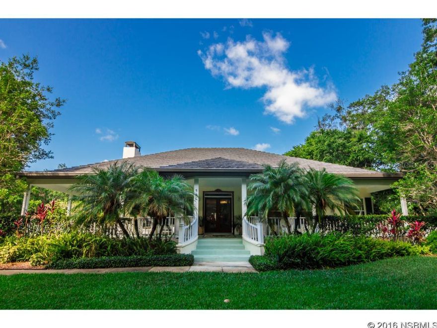 Under contract taking backups. Custom built southern living home with large wrap around front porch sitting on 1 acre of lush landscaping and canal.  Hardwood floors and tile throughout.  Kitchen boasts cherry cabinets, Silestone counters, island, and gas cooktop. The family room/ sun room is surrounded by windows looking out onto the canal and outdoor sitting area.  French doors open up from the living and dining room onto the oversized front porch. Study is located off of the foyer and can easily be used as 4th bedroom.  Home is wired for whole house generator, stemwall construction, Classic Product lifetime metal roof, 2 AC units, 4 zone irrigation system, 2 car garage with carport, outside shower, Kevlar hurricane shutters and 16x45 pavered area for boat or rv are just some of the details of this incredible home.  The canal is home to otters, turtles, and fish.  Within 1 mile to Publix and 4 miles to the beach. ;Water: City