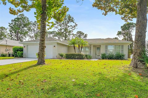 Photo of 128 Rolling Sands Drive, Palm Coast, FL 32164 (MLS # FC313950)