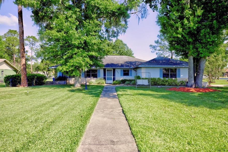 Welcome to this beautifully maintained 3-bedroom, 2-bathroom home situated on a desirable corner lot in the wonderful Golf Hammock community. Featuring a split floor plan for added privacy, this home combines comfort, functionality, and thoughtful updates throughout. Recent improvements include a 2018 roof and an updated air conditioning system with a UV light for enhanced air quality. Skylights bring in abundant natural light, creating a bright and inviting living space. The updated kitchen is a standout, showcasing elegant granite countertops, soft-touch cabinetry, and sleek stainless-steel appliances—perfect for both everyday living and entertaining. The spacious sunroom has been upgraded with energy-efficient Thermopane windows, offering a relaxing space to enjoy year-round. Step outside to enjoy a fenced-in yard and a peaceful pond view from the front of the home. Additional features include a 10x18 shed for extra storage and full wheelchair accessibility for added convenience. This home offers a perfect blend of modern updates, practical design, and scenic surroundings—schedule your showing today!