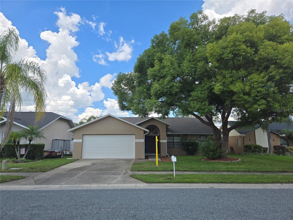 Photo of 8211 Matthew Drive, New Port Richey, FL 34653 (MLS # TB8549600)