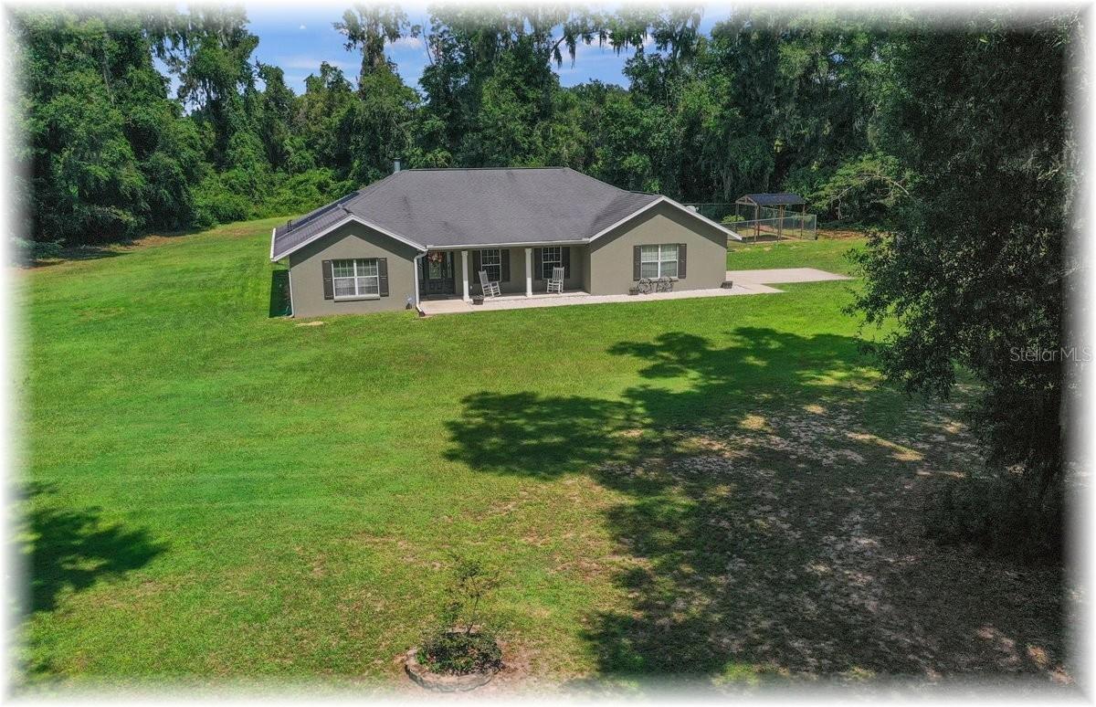 SE - CUSTOM BUILT TRUE 4 BEDRM POOL HOME – ALL ON 2.5 ACRES WITH LOTS OF PRIVACY – RIGHT NEXT TO FLA GREENWAY - PLUS BESIDE EXCLUSIVE GATED VIA PARADISUS EQUINE COMMUNITY – BUT HAS TREE BUFFERS FOR ADDITIONAL PRIVACY
THIS CUSTOM BUILT POOL HOME HAS LONG FRONT PORCH BRINGING YOU INSIDE ELEGANT FOYER WITH WOOD FLRS – THEN OPENING INTO HUGE LIVING RM WITH COZY STACKED STONE FIREPLACE, BEAUTIFUL WOOD FLRS & CATH CEILINGS
ALL OPEN TO FAMILY SIZED KITCHEN WITH LOTS OF WOOD CABS, GRANITE COUNTERS & UPGRADED STAINLESS STEEL APPLS – HAS RAISED BREAKFAST BAR OVERLOOKING TILE BREAKFAST NOOK LEADING OUT TO COVERED PORCH – PLUS HAS SEP FORMAL DINING RM FOR THOSE LARGE FAMILY GATHERINGS
HUGE SPACIOUS PRIVATE PRIMARY BEDRM HAS HUGE WALKIN CLOSET - PLUS GLAMOUR MASTER BATHRM W/TILE FLRS, DBL SINKS, GARDEN TUB PLUS LARGE GLASSED SHOWER & SEP POWDER RM
ALL GUEST BEDRMS HAVE PADDLE FANS W/LIGHTS ALONG WITH PLENTY OF CLOSET SPACE FOR STORAGE - FRONT 4TH GUEST BEDRM COULD EASILY BE SEP OFFICE OR FAMILY RM
TILE GUEST BATHRM HAS RAISED VANITY, SEP TUB/SHOWER COMBO PLUS DOOR OUT TO COVERED PORCH MAKING IT EASIER TO HAVE ACCESS TO POOL - INSIDE TILE LAUNDRY RM - OVERSIZED SIDE ENTRY DBL GARAGE W/OPENER
COVERED PORCH HAS TRIPLE SLIDERS THAT HIDE AWAY PERFECT FOR FAMILY BBQS – ALL OVERLOOKING HUGE PRIVATE BACKYARD – SOLAR HEATED INGROUND POOL HAS SEP SWIM OUT AREA FOR YOUR CHAIRS TO RELAX IN THE WATER – EVEN HAS BABY FENCING FOR KEEPING THE LITTLE ONES SAFE
PROPERTY HAS SEP FENCED AREA PERFECT FOR YOUR PETS OR A HORSE – EVEN HAS DET COVERED CARPORT FOR KEEPING THEM OUT OF THE SUN – OR TO STORE YOUR SMALLER RV
YOU WILL LOVE THIS HOME – EVEN HAS WHOLE HOME GAS GENERATOR WITH BURIED TANK – WHICH WILL BE WONDERFUL SHOULD THE PROPERTY EVER LOSE POWER – PERFECT FOR KEEPING YOUR FAMILY SAFE & HAPPY