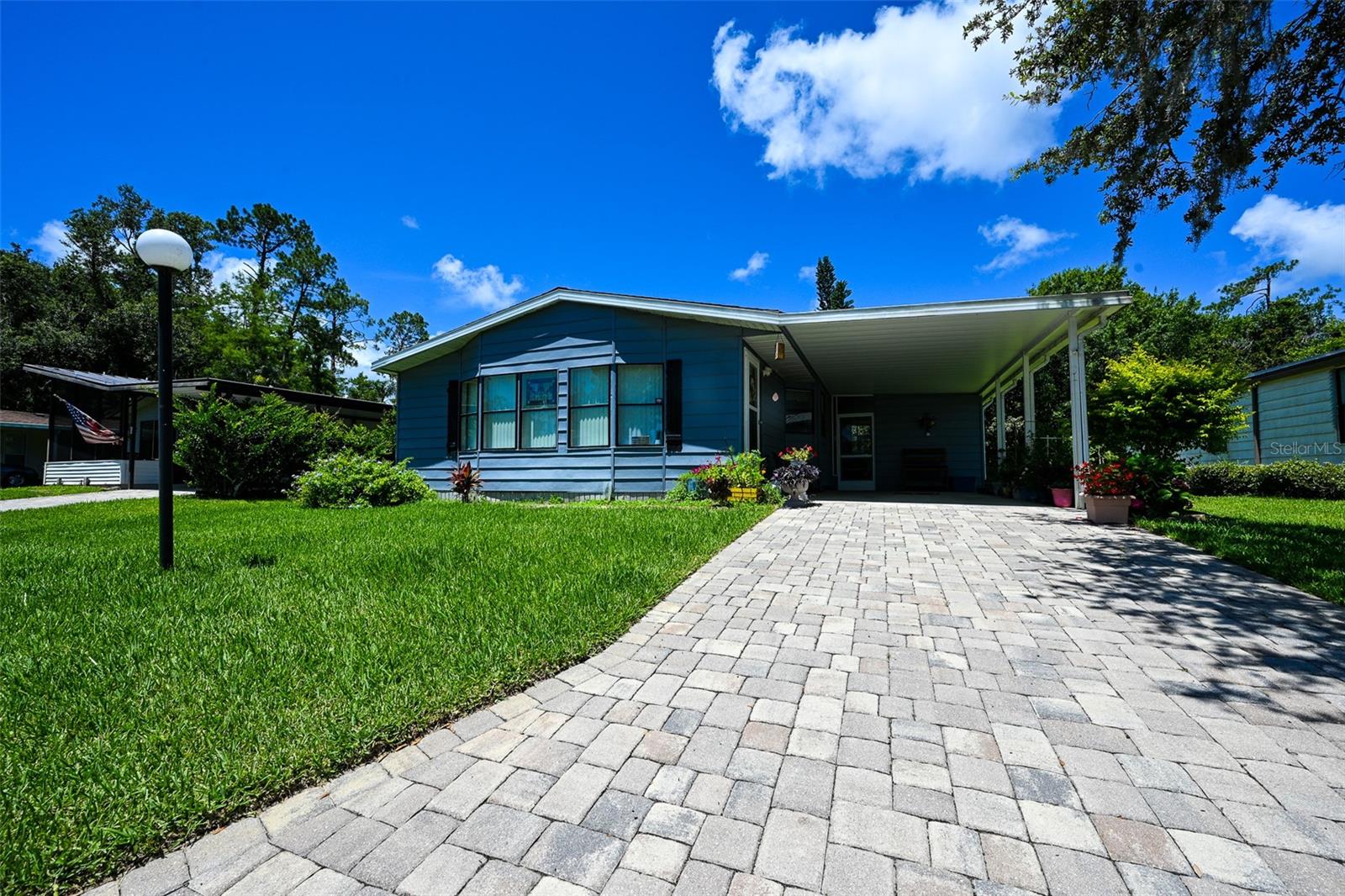 Welcome to this vintage charm 2-bedroom,2-bathroom home in the beautiful community of The Falls at Ormond Beach! It features a 2-car carport and a relaxing Florida room, perfect for unwinding and enjoying a cup of coffee and a good book. A bonus trait of the house is its large master bath with double sinks and wall to wall counterspace. There is a large kitchen, opening up to the spacious living area with plenty of natural light, giving it a cozy and inviting feel. The community offers a wide range of amenities, such as a heated pool and hot tub, dog park, tennis courts, a mini golf course, a library, scenic lake views, and a fitness center. Showings are appointment only, call or email for any questions regarding to the HOA. Purchase and lease option available.