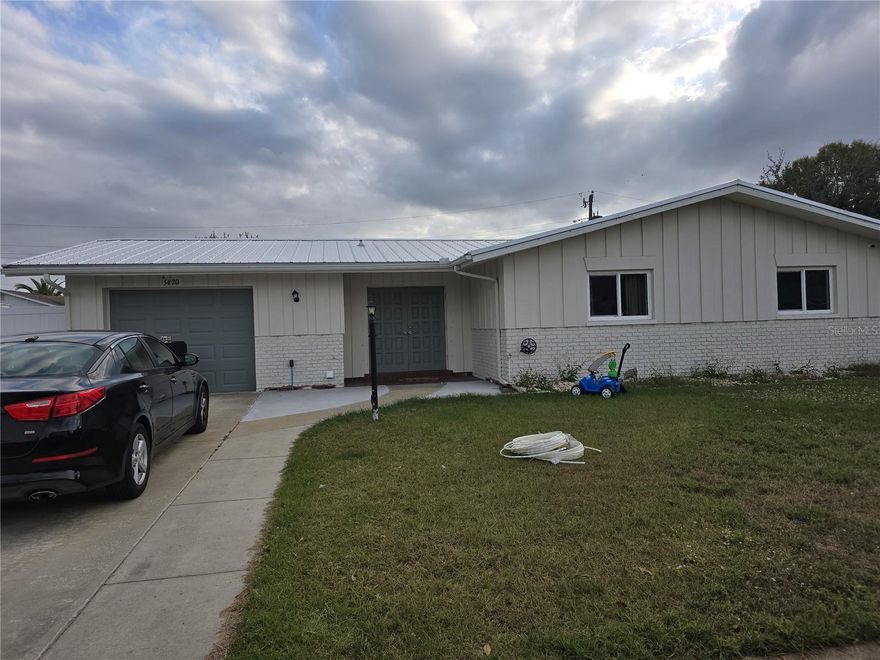 GREAT HOME FOR THE FIRST TIME HOMEBUYER, 3 BEDROOMS 2 BATHS, ONE CAR GARAGE, VINYL FLOORING, IMPACT WINDOWS, REMODELED KITCHEN, NEW METAL ROOF, WATER FILTRATION SYSTEM, COVERED PATIO/LANAI, NICE FENCED BACKYARD, 
PAINTED IN NEUTRAL COLORS SEPARATE DINING/BREAKFAST AREA.
GREAT LOCATION CLOSE TO SOPING CENTERS, HOSPITALS, EASY ACCESS TO I-75.