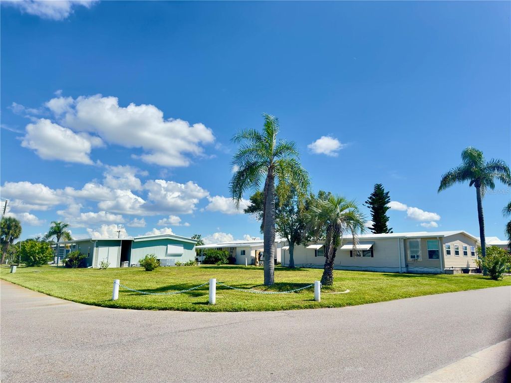 Photo of 401 Blackburn Boulevard, North Port, FL 34287 (MLS # C7515505)