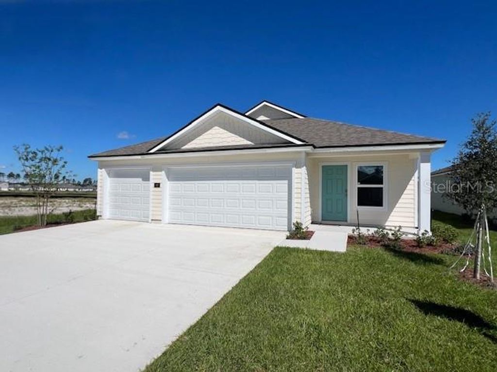Photo of 46 Sawdust Lane, Palm Coast, FL 32137 (MLS # FC312138)