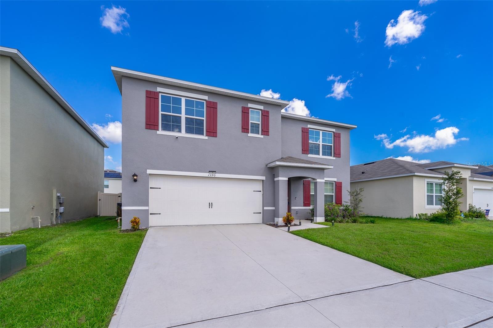 Beautiful home!!! Located right next to Championsgate. Come see this spacious 5 bedroom, 3 bath home with upgraded countertops, tile throughout, a flex room by the foyer, and a loft area on the second floor given you plenty of room under one roof. This home also has an owners suite with his and hers walk in closets. The house is built with block over block construction and is also wired to be a smart home. The home features a beautiful open kitchen with stainless steel appliances and an island great for entertainment. The back yard is fenced and is ideal for your privacy and security and also great use if you have pets. The home is also located near grocery stores and is just minutes away from I4, Posner Park, restaurants, schools, Disney and much more. All of this with no CDD and a low HOA. Schedule your showing today!!!