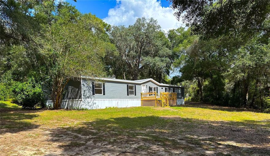 Beautifully Updated 3-Bed, 2-Bath Home on Over an Acre – NO HOA!
Discover country living at its best in this beautifully remodeled double-wide manufactured home on a spacious 1-acre lot in Hernando, FL. This move-in ready property features NEW vinyl flooring, fresh interior and exterior paint, and modern light fixtures throughout. The updated kitchen shines with brand-new quartz countertops, contemporary cabinetry, and stylish finishes, perfect for cooking and entertaining. The open and airy layout offers plenty of natural light and comfort in every room.
Enjoy the freedom of NO HOA and the space to create your ideal outdoor retreat—perfect for pets, gardening, or adding a workshop. Conveniently located near local shops, dining, and recreational spots, this home offers the perfect mix of tranquility and accessibility.
Don’t miss your chance to own this beautifully updated property with modern charm and plenty of land!