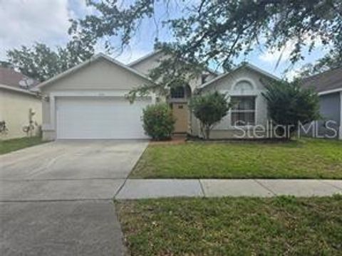 Photo of 1639 Nestlewood Trail, Orlando, FL 32837 (MLS # O6364400)