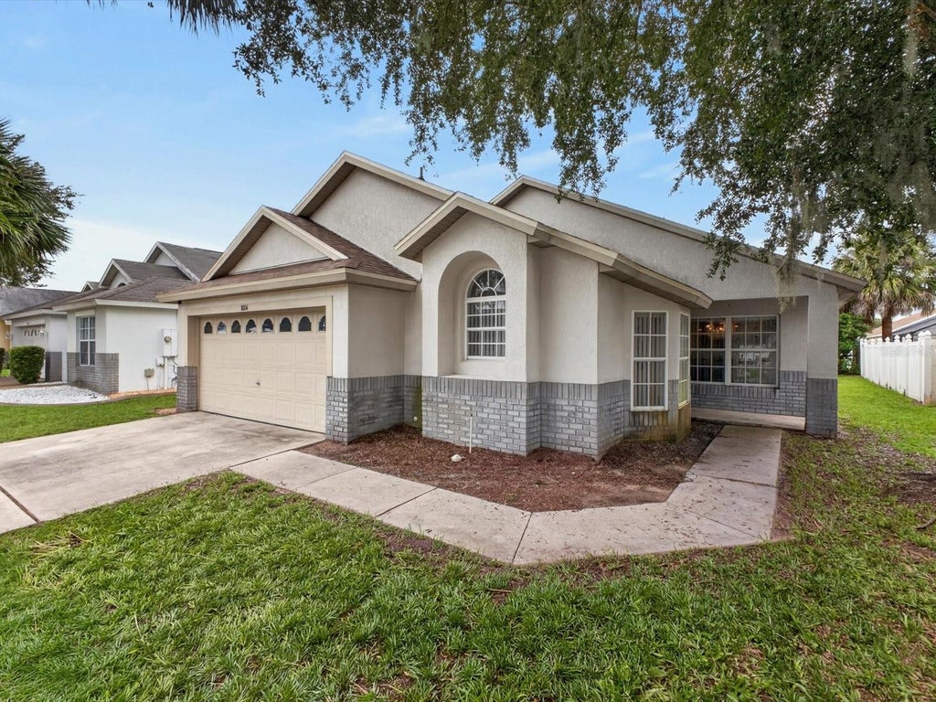 Photo of 8014 Spring Creek Drive, Kissimmee, FL 34747 (MLS # O6438647)