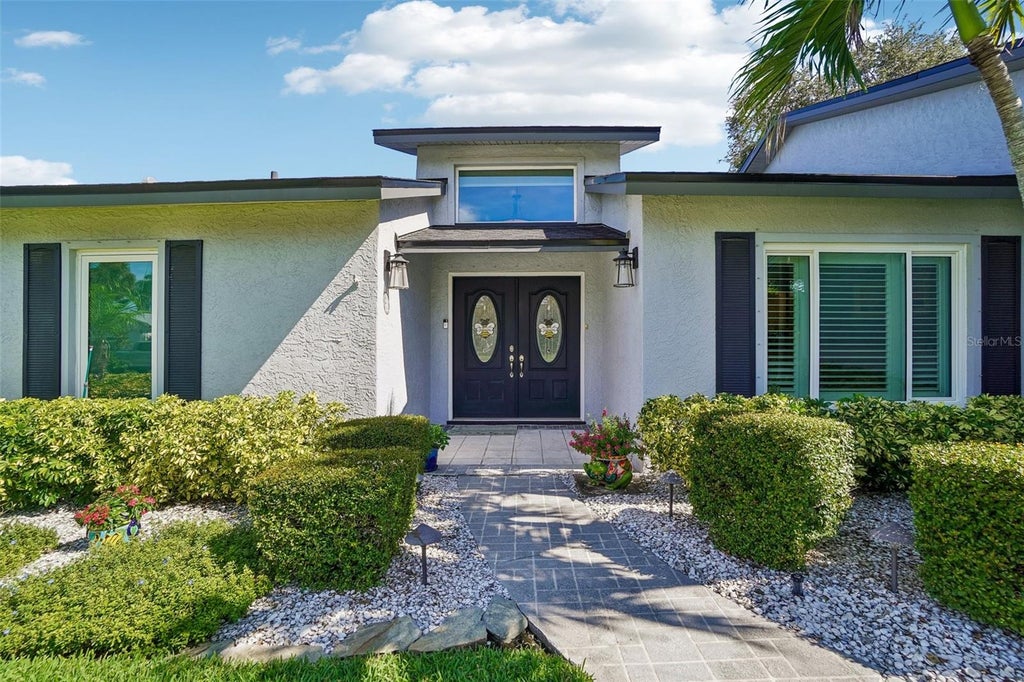 Photo of 971 Cortland Way, Palm Harbor, FL 34683 (MLS # TB8548247)