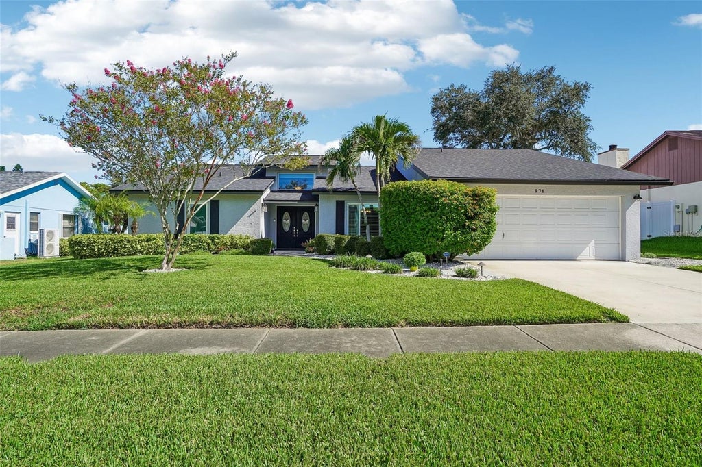 Photo of 971 Cortland Way, Palm Harbor, FL 34683 (MLS # TB8548247)
