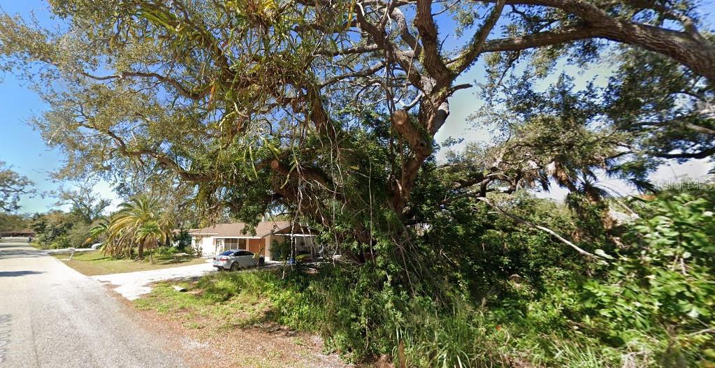 Discover the endless possibilities with this vacant lot nestled in the heart of beautiful Venice, Florida! Perfectly situated just moments away from pristine beaches, vibrant historic downtown, and the serene Shamrock Park. Fantastic location west of Tamiami Trail (Gulf side) with easy access to Venice Beach Ferry (membership optional). This well sought out area of Venice has picked up a lot of momentum for both investment & long term living.
Imagine crafting your very own dream home on this spacious lot, designed to harmonize with the natural beauty that surrounds you. Whether you envision a luxurious weekend getaway or a cozy year-round residence, this location offers everything you need for the ultimate coastal lifestyle. Connect with one of our recommended builders who offer basic models to custom designs, steel frame homes. This lot is on private utilities septic and well.