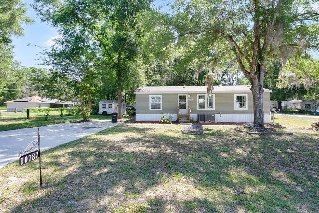 Photo of 10787 SW 112th Avenue, Dunnellon, FL 34432 (MLS # OM723649)