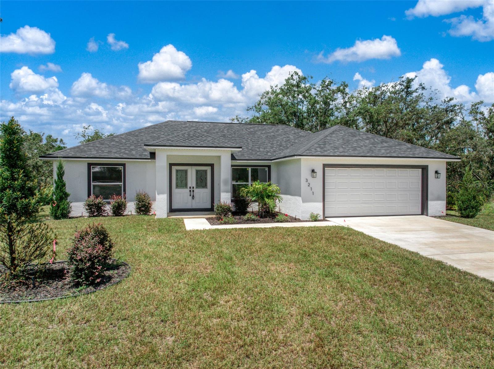 Don't miss your opportunity to own this beautifully designed single-story home that blends modern sophistication with everyday convenience. Featuring 3 bedrooms, 2 full bathrooms, a private 2-car garage, this home is perfectly tailored for Florida living. The open-concept layout creates a seamless flow from the spacious living area to the kitchen and dining room, which are designed with stainless steel appliances, quartz countertops, and luxury vinyl plank flooring. Every detail is crafted to enhance your lifestyle, including an owners bath with double vanities and a generous walk-in close and a laundry room complete with a washer and dryer. Located in Avon Park Lakes.