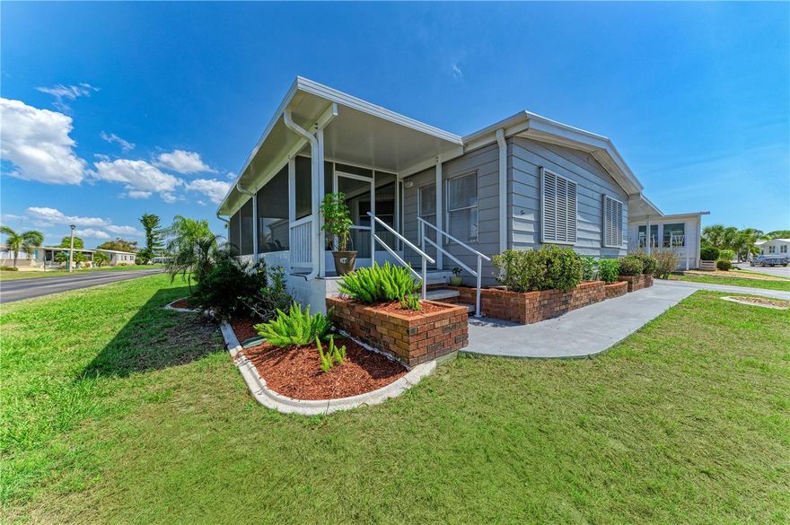 Welcome to coastal living in the desirable 55+ waterfront community of Alameda Isles, located in the charming town of Englewood. Alameda Isles offers the perfect blend of comfort, convenience, and a socially active Florida lifestyle within a beautifully maintained, resident-owned gated community. This particular home sits on a beautiful corner lot with a brand new carport and 2 screened in porches. Recently rebuilt and completely remodeled, this home offers a fresh top-to-bottom transformation with new flooring, cabinetry, and a brand new roof. Enjoy a bright and open-concept layout featuring two bedrooms, two beautifully updated bathrooms and spacious walk-in closets. Residents enjoy boating access with nearby waters of Lemon Bay and convenient access to the intercoastal Waterway and Gulf. Recreational facilities include a heated community swimming pool, therapeutic spa/hot tub, Waterfront clubhouse with an event hall and library/reading lounge, Craft Room with Kiln, Billards Room, Fitness center with Sauna, Tennis, Pickleball, Bocce ball and Shuffleboard courts, Craft room with kiln, Woodworking shop, Private park and picnic areas, 58-slip marina with access to the Intracoastal Waterway and Gulf, RV and boat storage and numerous social clubs and community events.