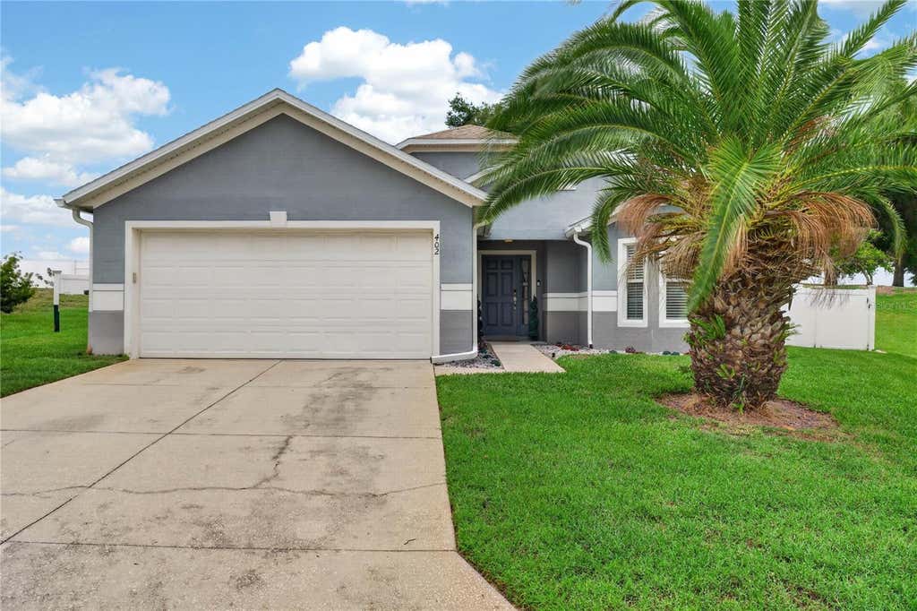 Photo of 402 Delancey Drive, Davenport, FL 33837 (MLS # O6413413)