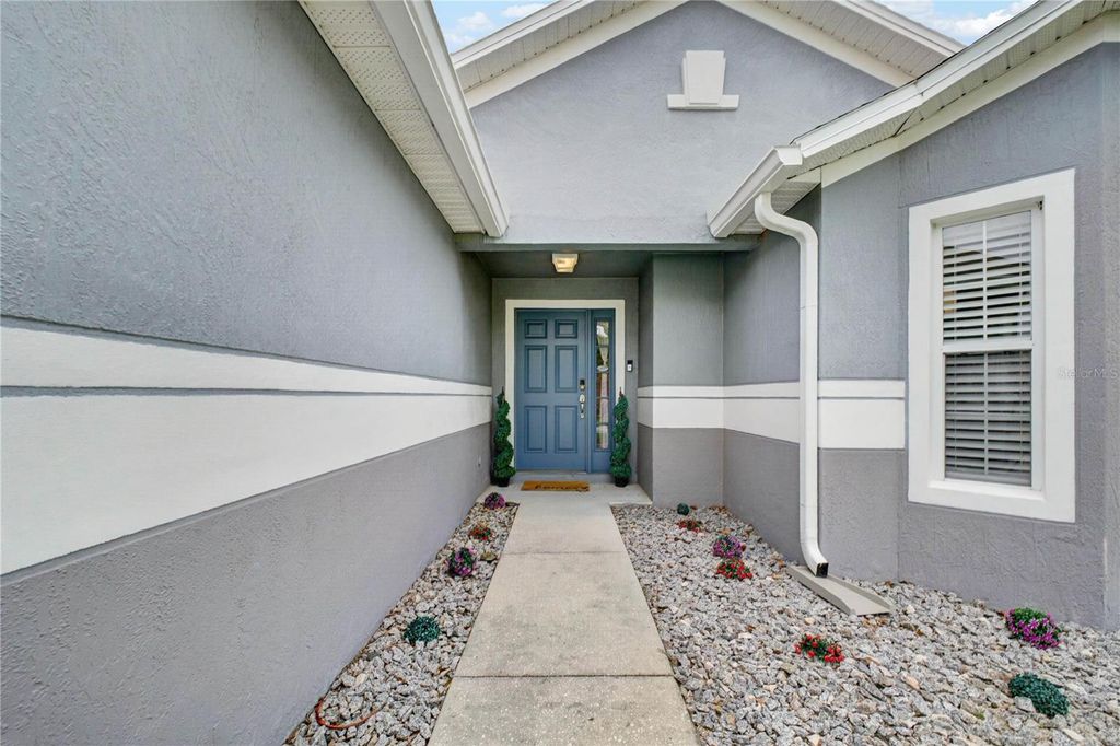 Photo of 402 Delancey Drive, Davenport, FL 33837 (MLS # O6413413)