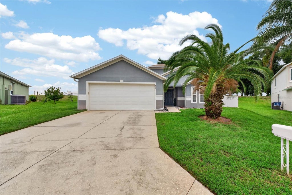 Photo of 402 Delancey Drive, Davenport, FL 33837 (MLS # O6413413)